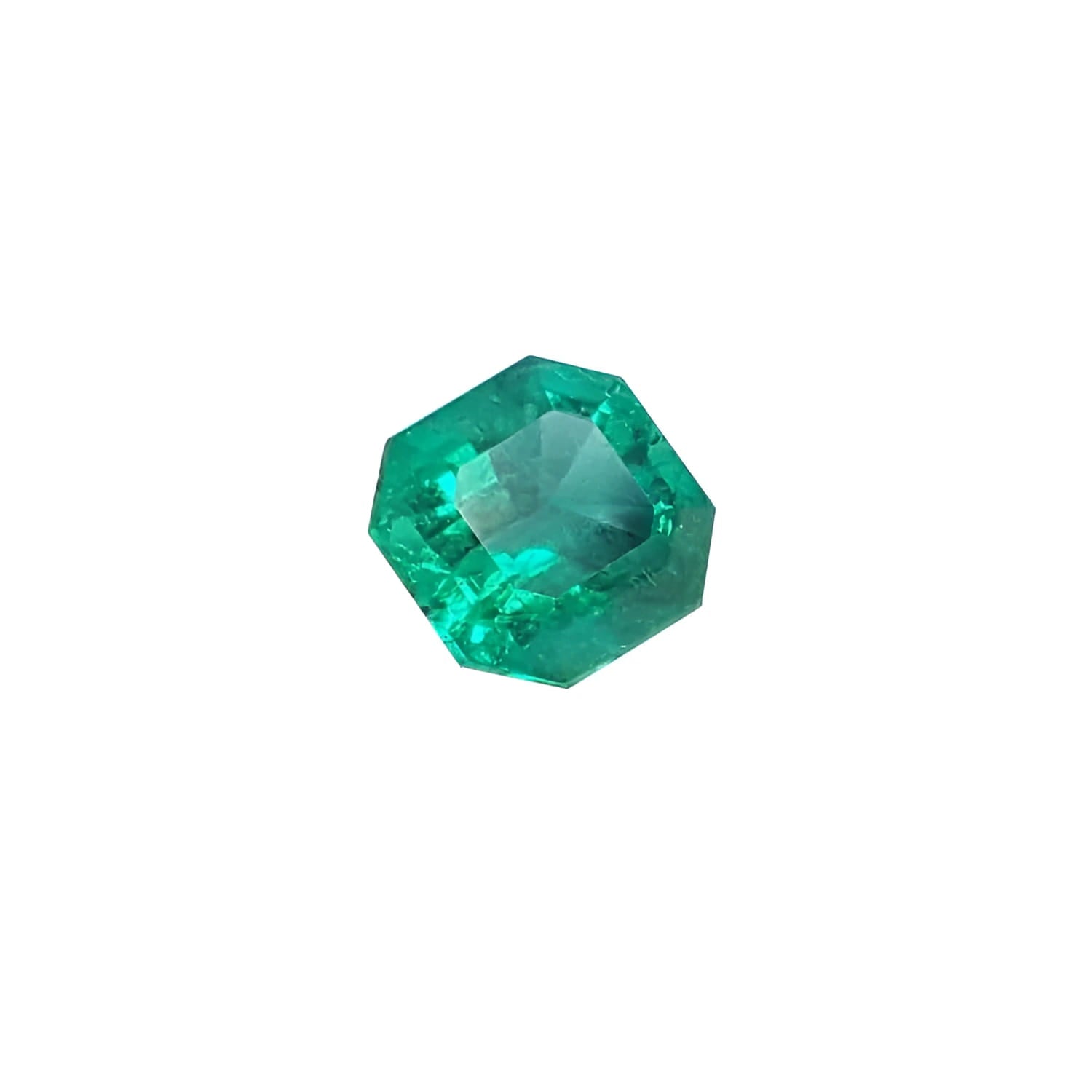 GIA certified 1.40 carat emerald-cut Colombian emerald with sparkling bluish medium-deep green color.