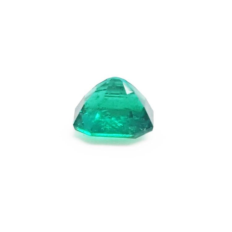 GIA certified 1.40 carat emerald-cut Colombian emerald with sparkling bluish medium-deep green color.