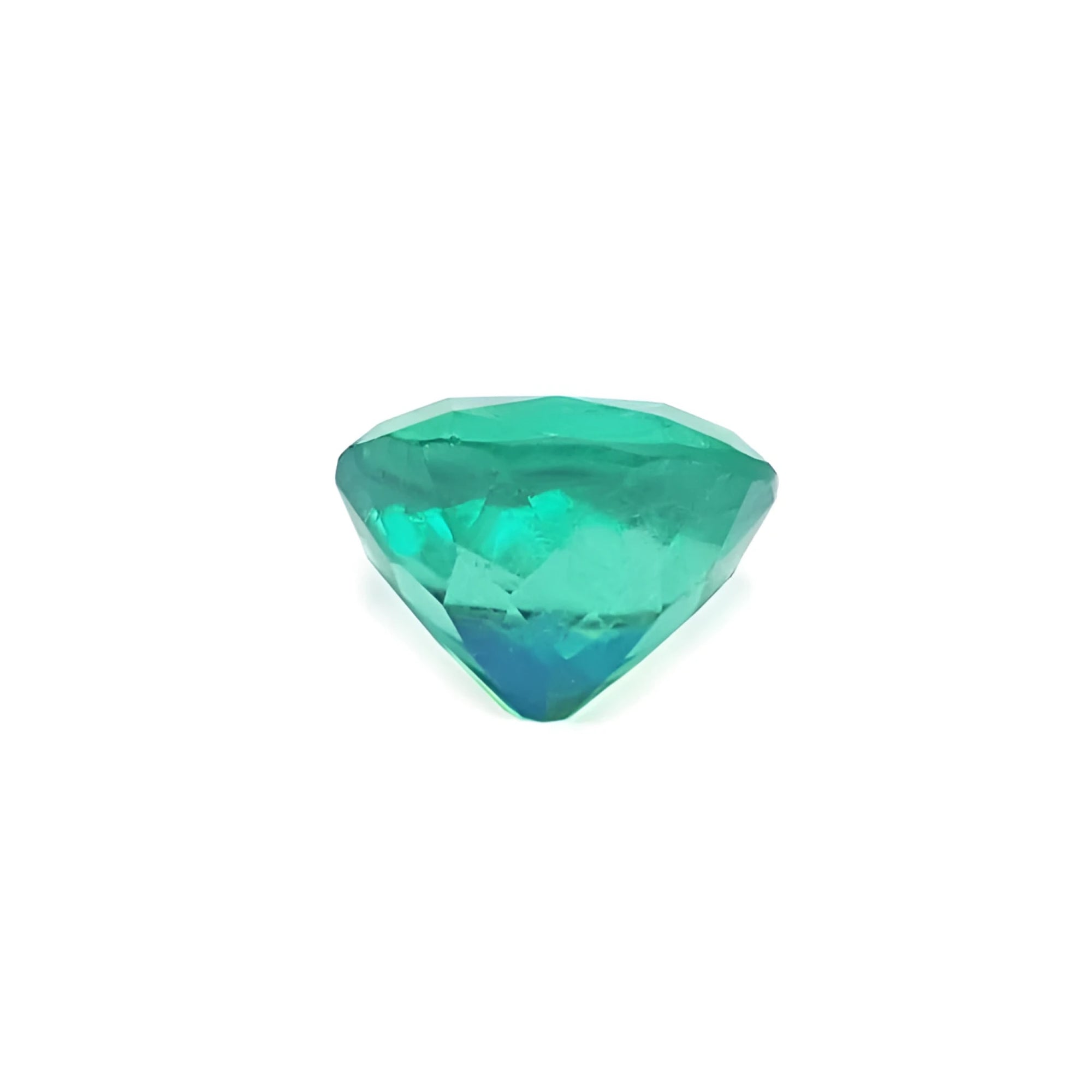 5.21 carat GIA certified cushion cut natural Colombian emerald with vibrant bluish-green hue.
