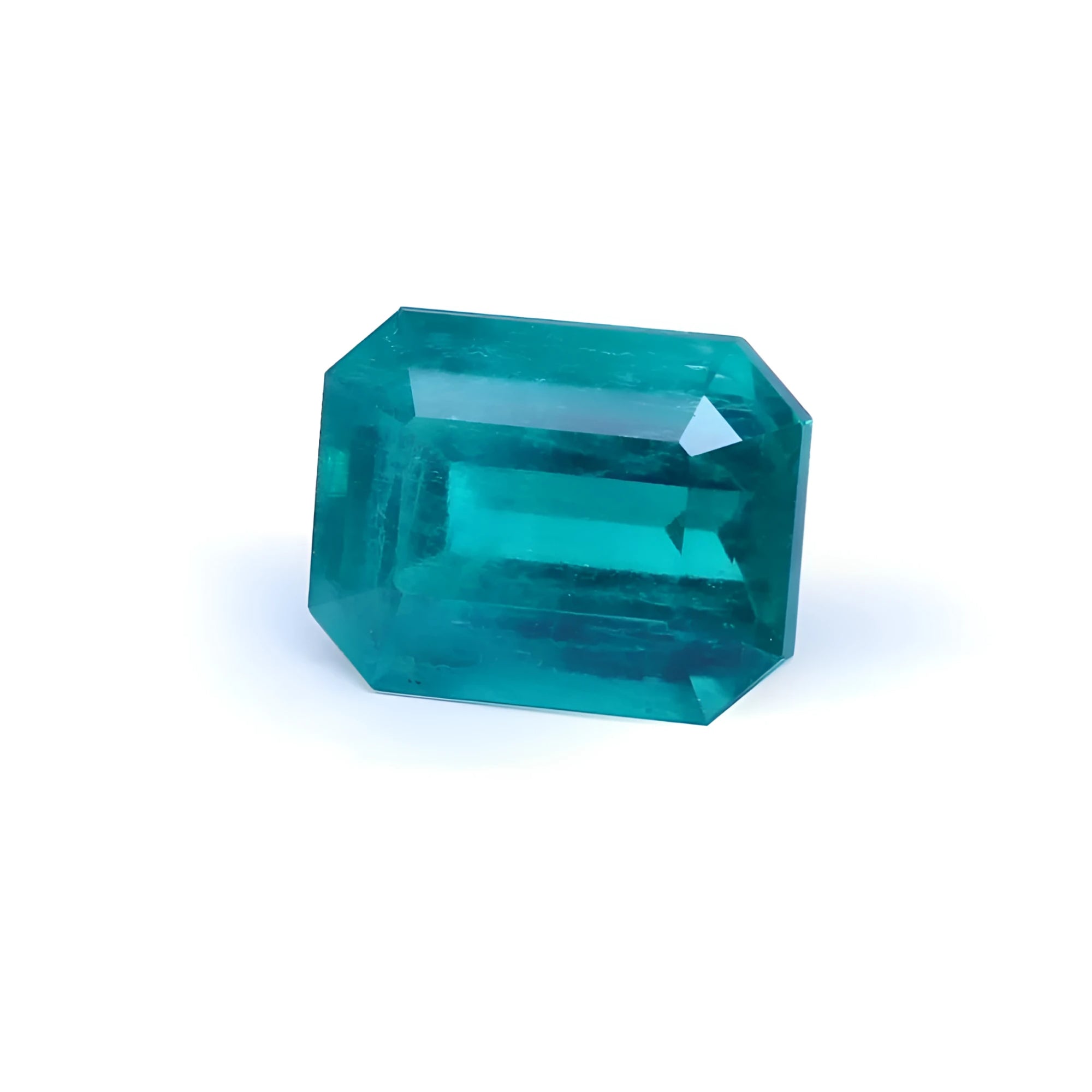 Untreated 3.98 ct. Muzo emerald, vibrant bluish medium-deep green, rectangular emerald cut.