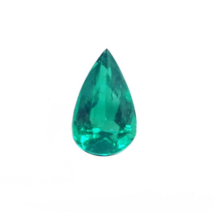 GIA certified loose emerald pear cut front view displaying table and crown 