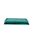 3.13 carat baguette cut Colombian emerald with sparkling bluish-green color.
