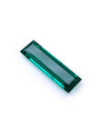 3.13 carat natural Colombian emerald, baguette cut, deep bluish-green, eye-clean.