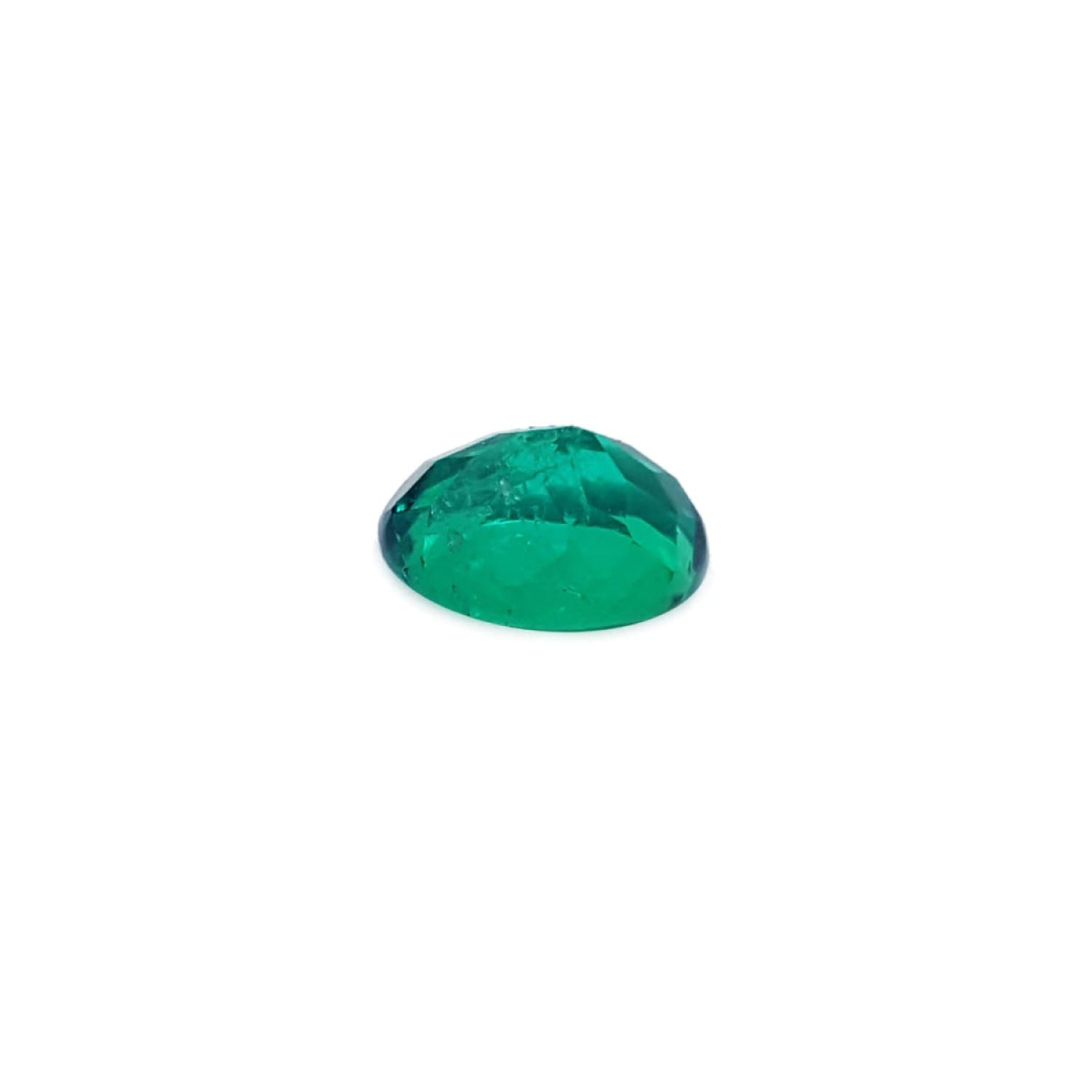 GIA Certified F1 0.98 ct. Oval Muzo Colombian Emerald loose emerald bluish green hue.
