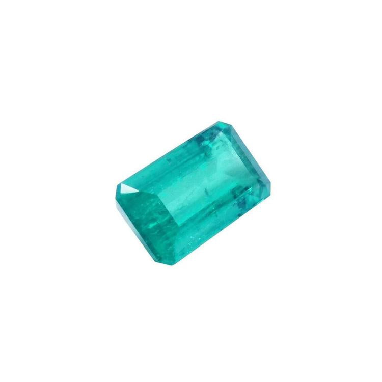 GIA certified loose colombian emerald rectangular right-side table and crown view