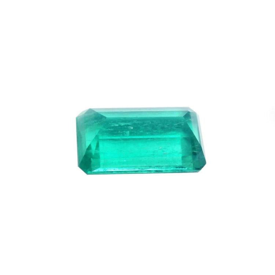 2.47 carat GIA certified loose Colombian emerald, sparkling bluish-green, emerald cut.