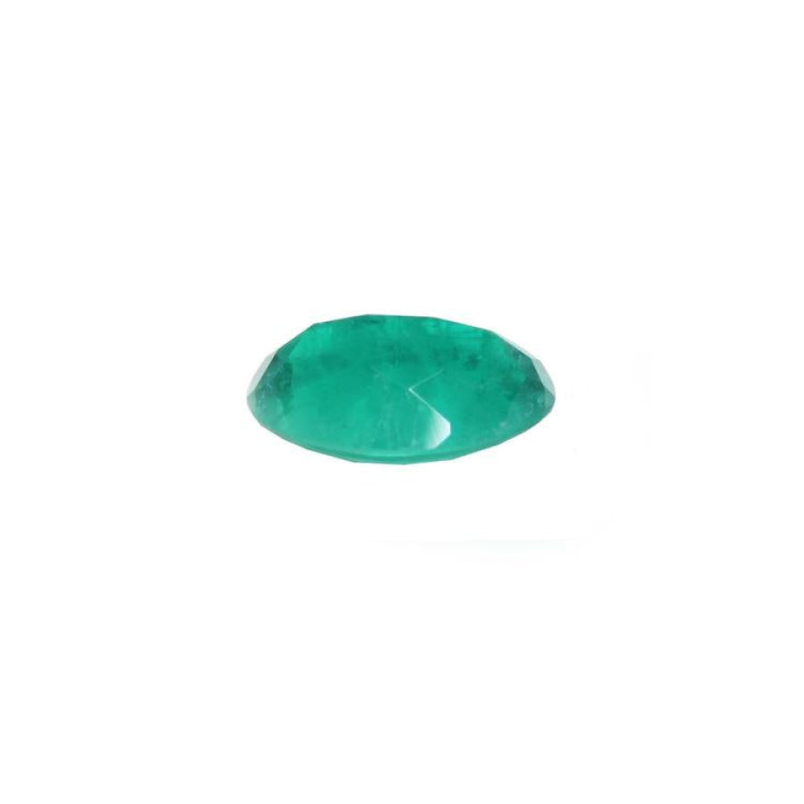 3.68 ct GIA certified oval emerald from Colombia, displaying a bright bluish-green color.