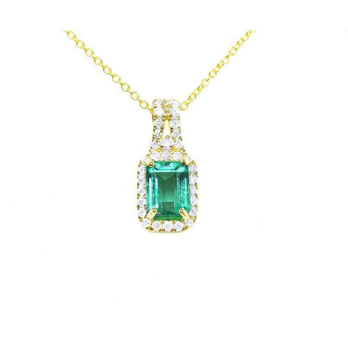 14K gold emerald-cut Colombian emerald necklace with halo diamonds on a delicate chain.