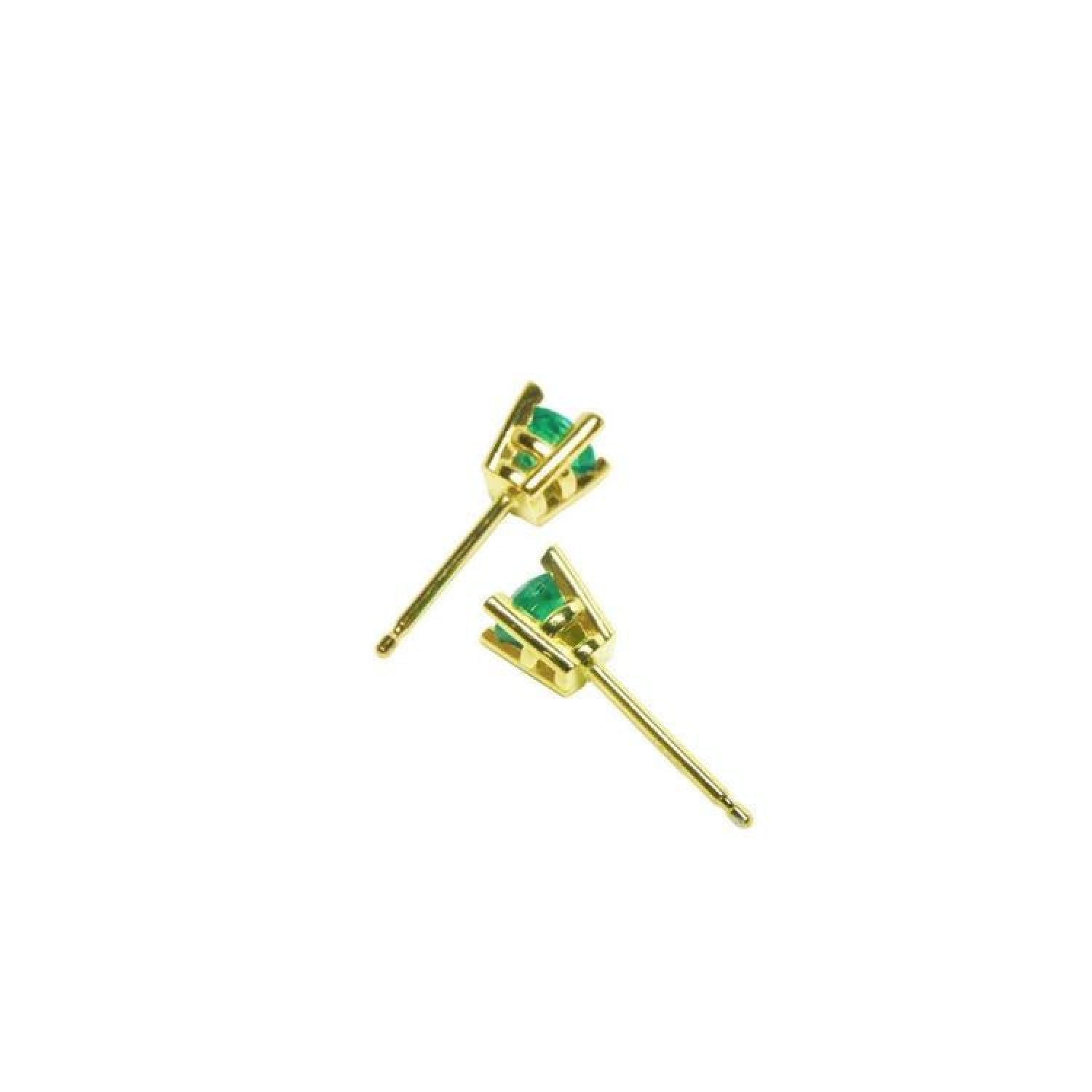 Girls' 14K gold stud earrings with round natural Colombian emeralds.