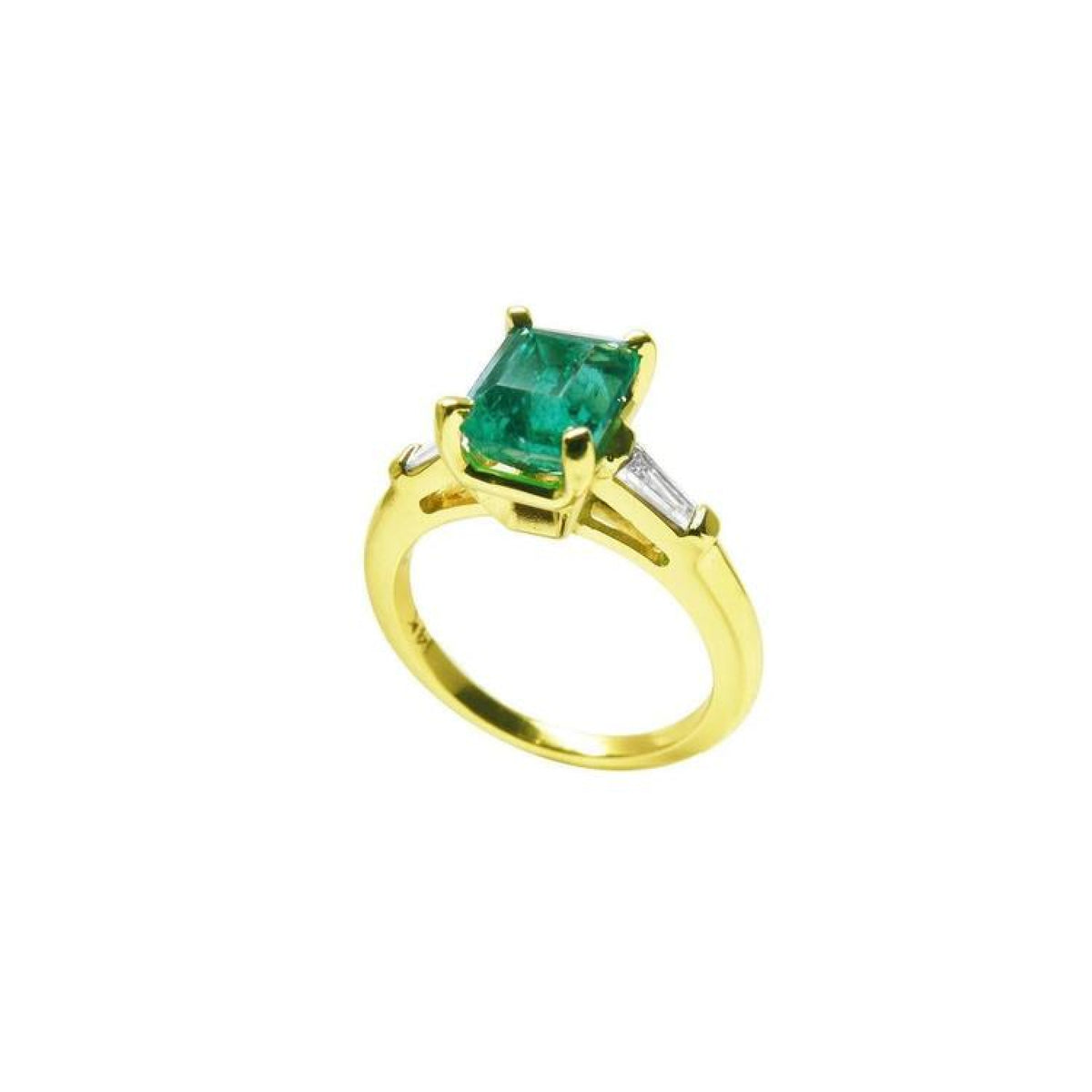 14K gold ring with a rectangular emerald-cut emerald and tapered baguette side diamonds.