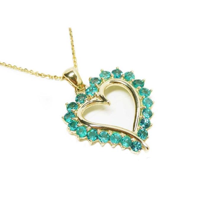 Gold heart-shaped pendant with round cut natural emeralds on a right topside view.