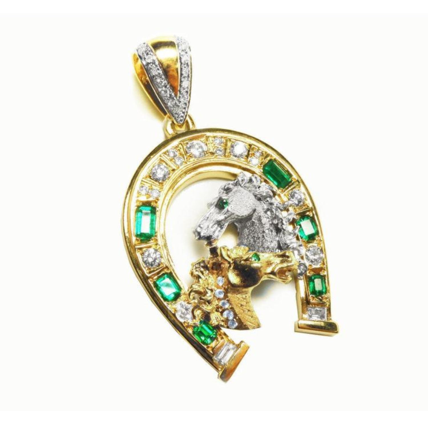 Equestrian jewelry natural emerald horseshoe pendant and natural diamonds crafted in 18k yellow gold.