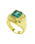 A square mens emerald solitaire ring in yellow gold and bezel set, top and side profile view.