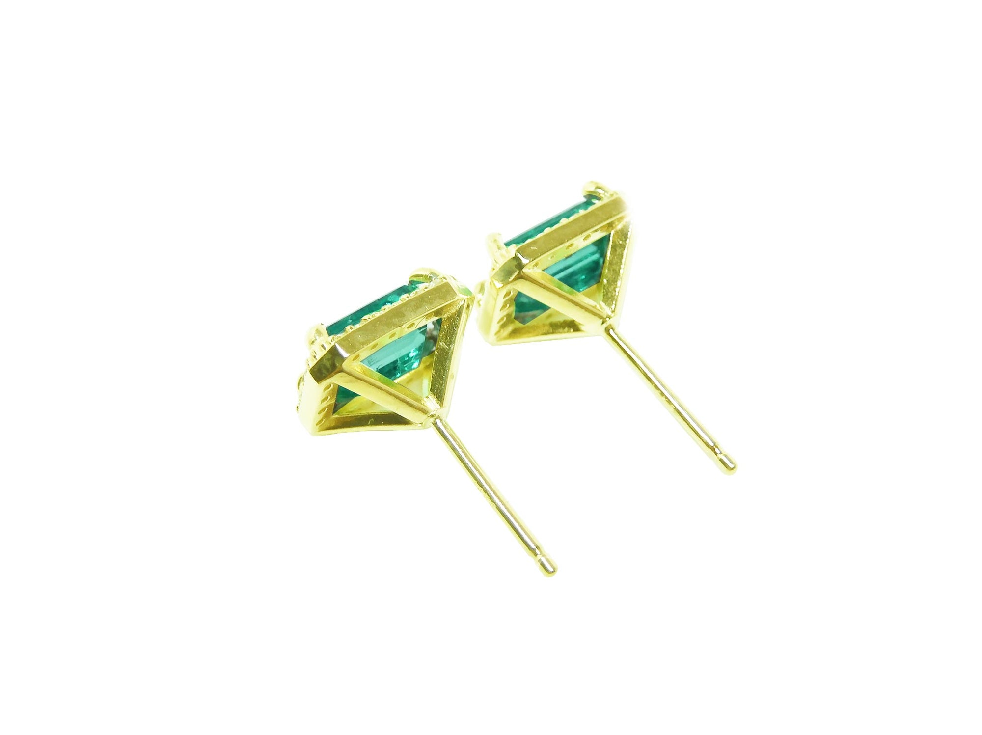 Yellow gold emerald stud earrings, push backs, left underside profile view