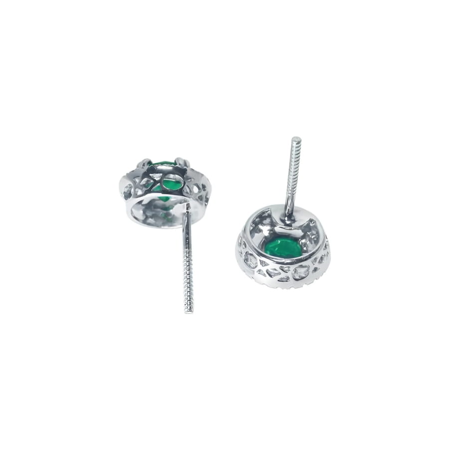 1.06 ct deep bluish-green emerald stud earrings with diamond halo and secure screw backs in 14K white gold.