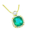 Natural emerald necklace 8.07 carats encircled in a halo of natural diamonds 18k yellow gold.