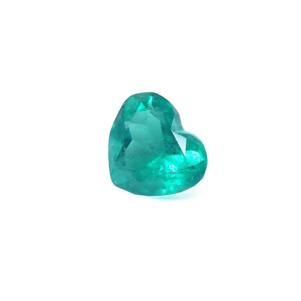 Heart-shaped emerald gemstone front let side looking at table and crown's gem