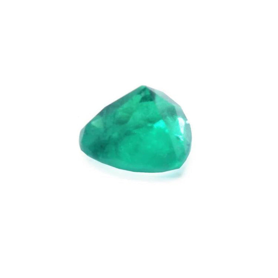 1.26 ct heart cut Colombian emerald with vibrant bluish-green color on a white background.
