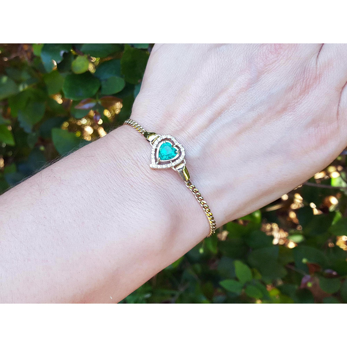 Heart cut halo diamond emerald bracelet 14k yellow gold