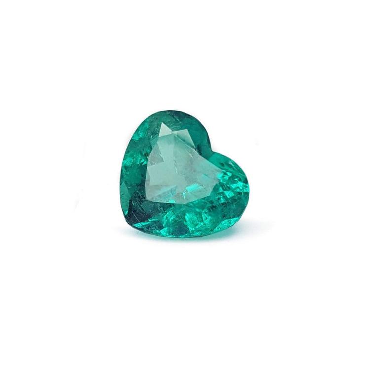 GIA certified heart cut natural colombian emerald, sparkling bluish medium-deep green color.
