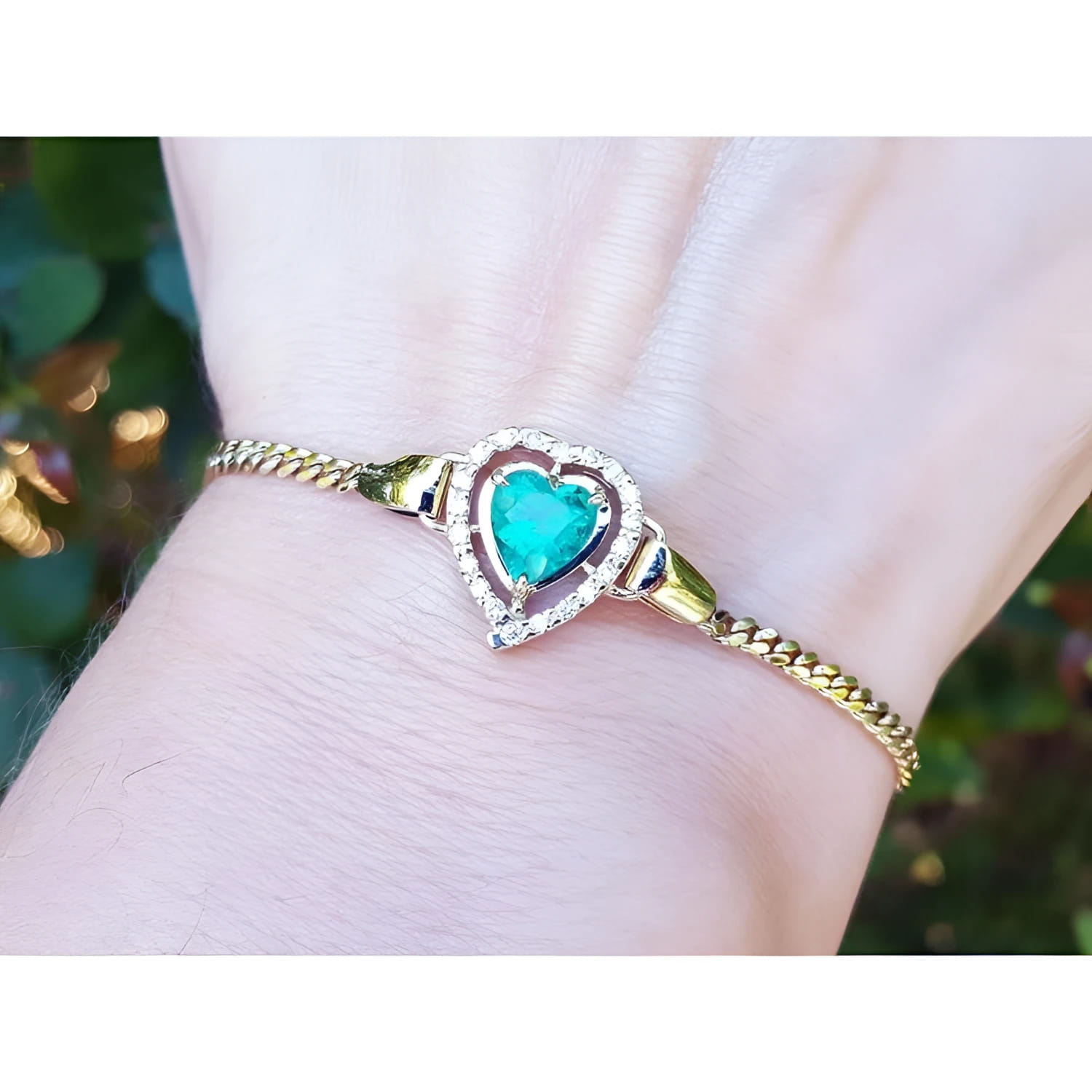 Heart Shaped Bracelet 1.24 ct. real Colombian emerald surrounded by natural sparkling diamonds, handcrafted in 14k yellow gold.