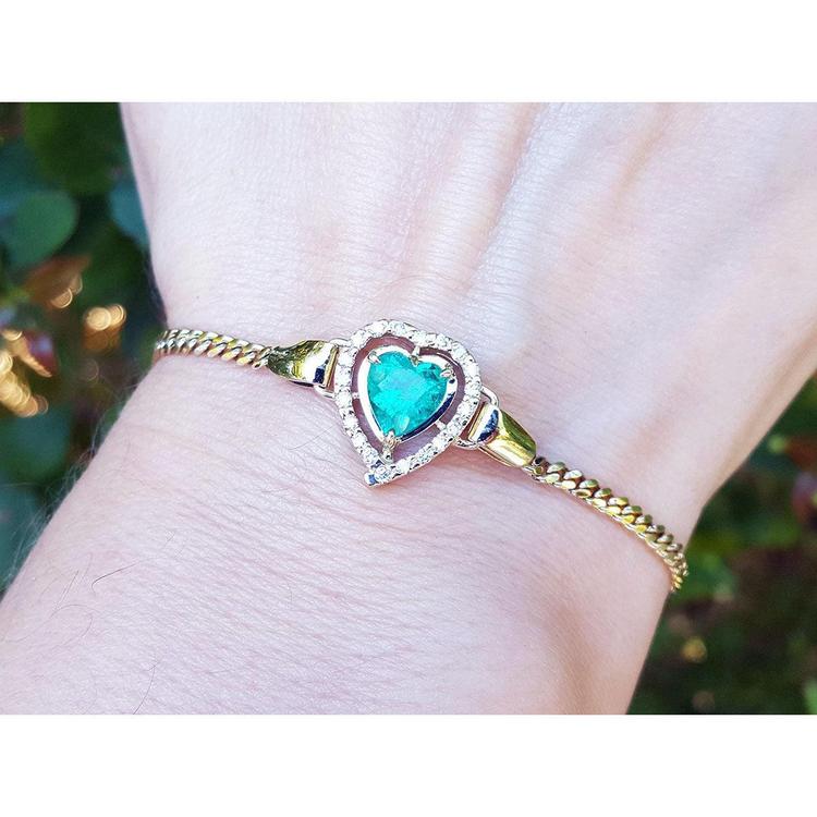Heart Shaped Bracelet 1.24 ct. real Colombian emerald surrounded by natural sparkling diamonds, handcrafted in 14k yellow gold.