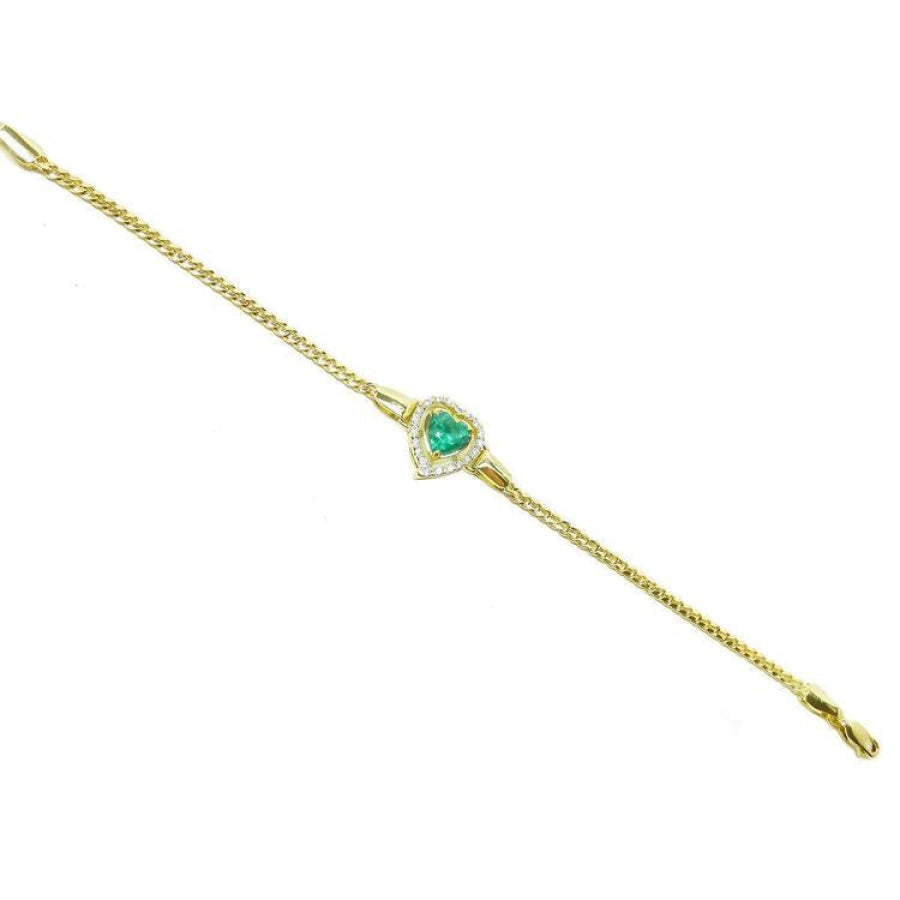 14K yellow gold bracelet with a heart-shaped emerald surrounded by sparkling diamonds.