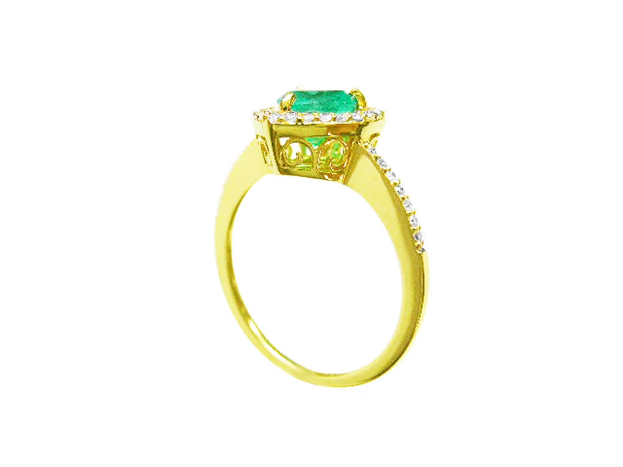 A heart cut emerald engagement ring halo diamonds 14k yellow gold. on a white background.