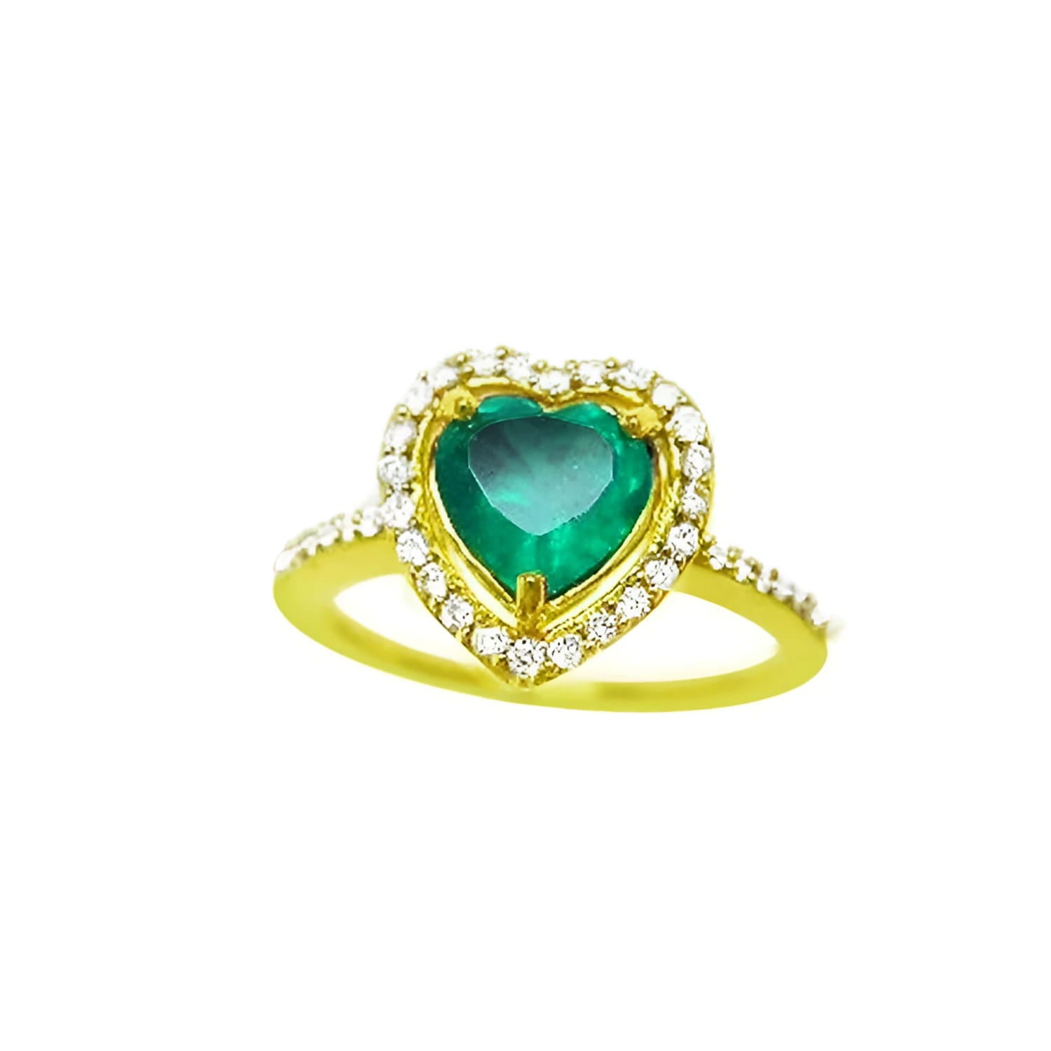 A heart cut emerald engagement ring with a halo diamonds 14k yellow gold.