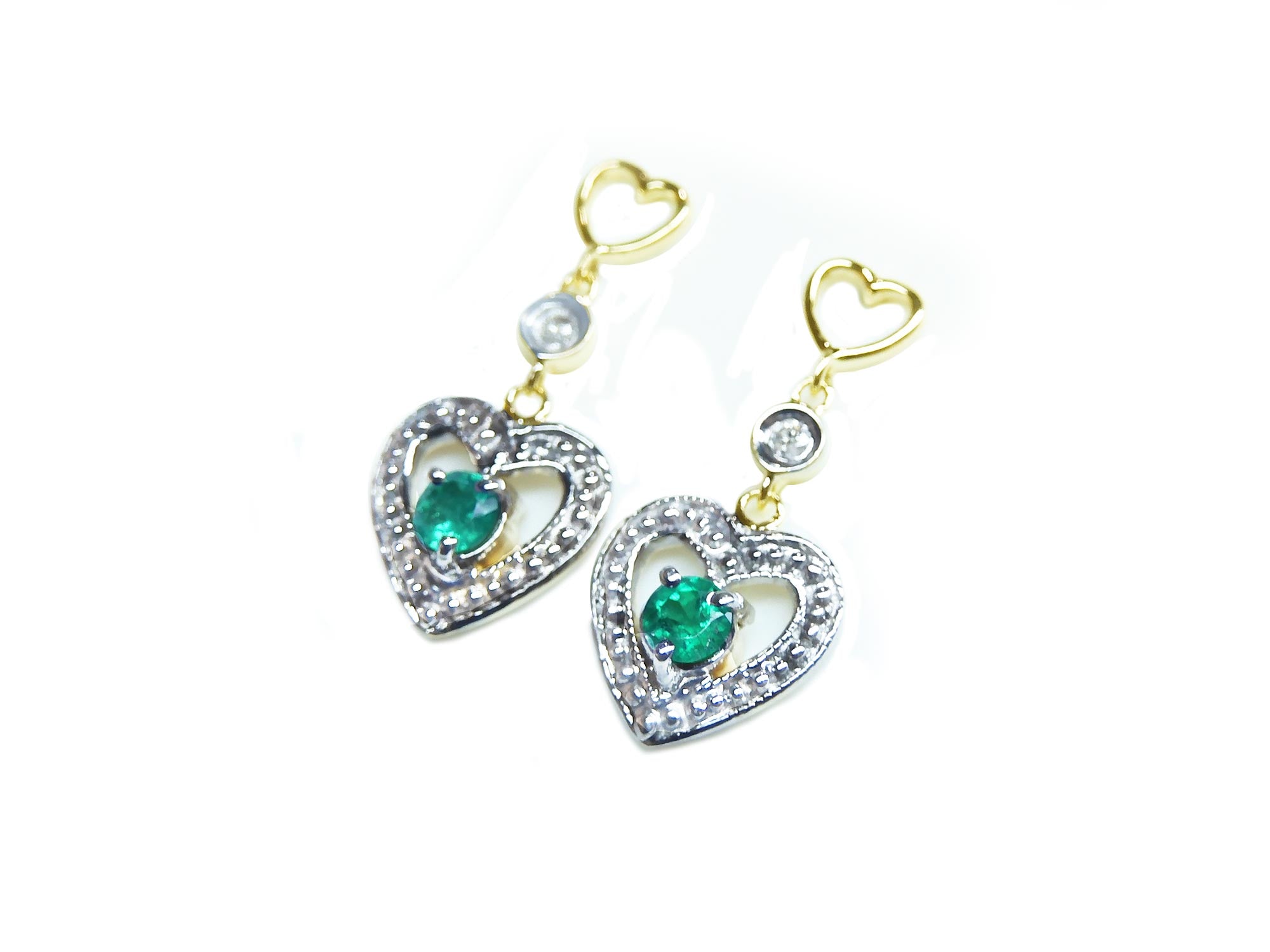Left position emerald heart earrings yellow gold, top and side view