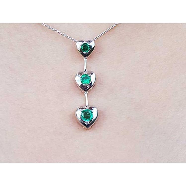 Round cut natural emeralds journey necklace heart pendant.