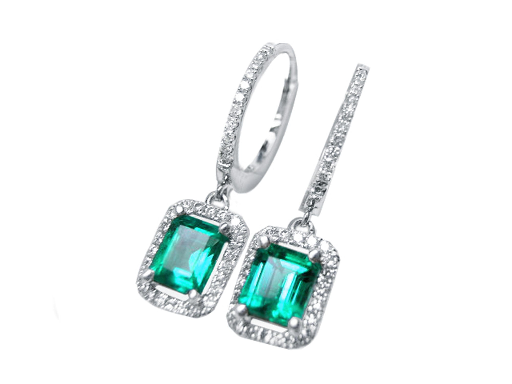 Pair of Colombian dangle emerald hoop earrings, plain top view on a left side position.