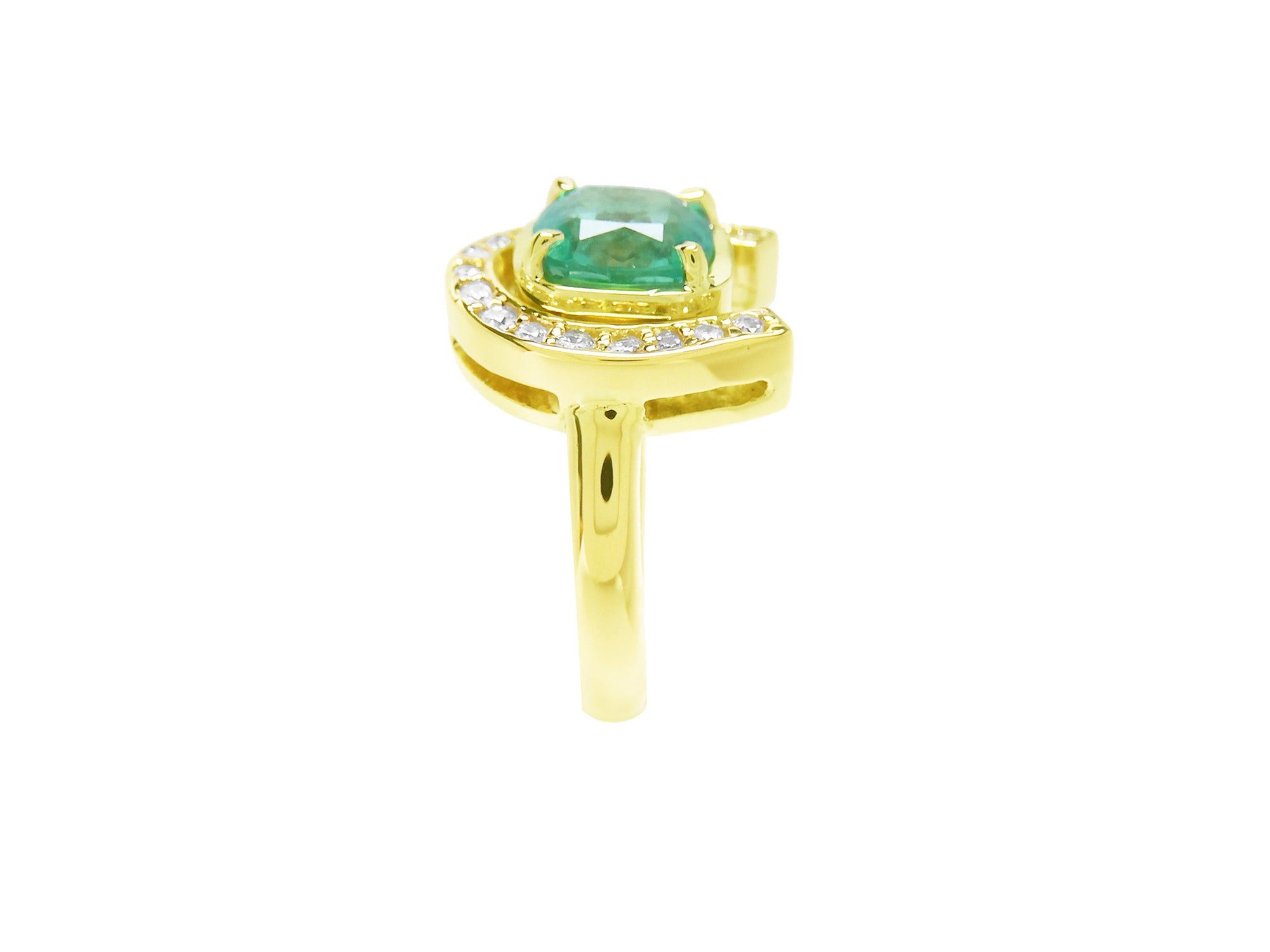 The side profile view of a horseshoe emerald ring for women crafted in 14k yellow gold.
