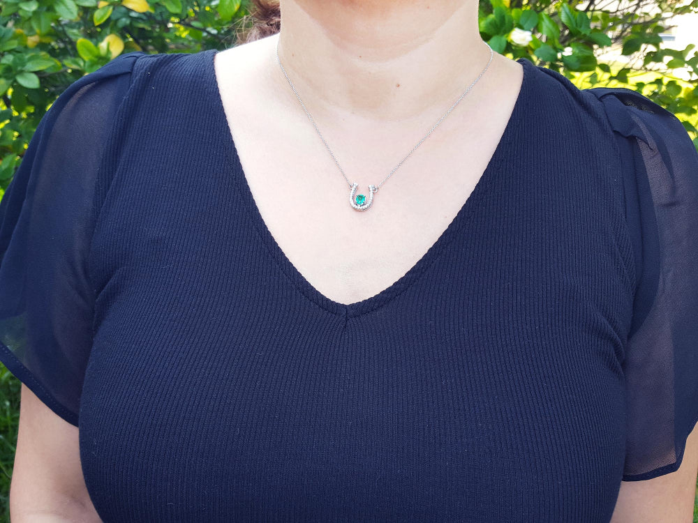 women&#39;s Horseshoe natural emerald necklace with natural diamonds, crafted in 14k white gold, a lucky piece of jewelry to wear every day