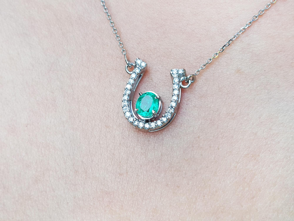Genuine emerald horseshoe necklace with natural diamonds, crafted in 14k white gold, a lucky piece of jewelry to wear every day