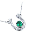 Genuine emerald horseshoe necklace with natural diamonds, crafted in 14k white gold, a lucky piece of jewelry to wear every day