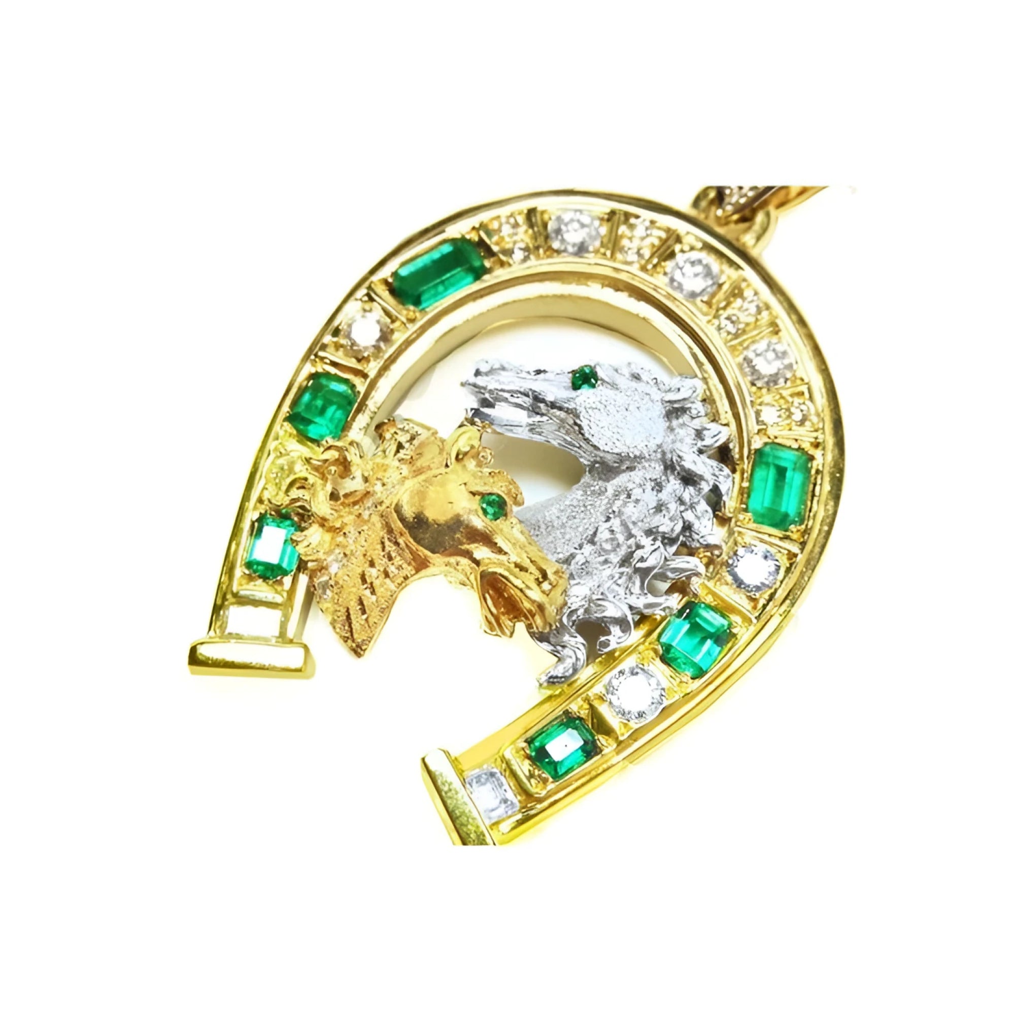 18K yellow gold horseshoe pendant with emeralds, diamonds, and two horse heads, one gold, one silver.