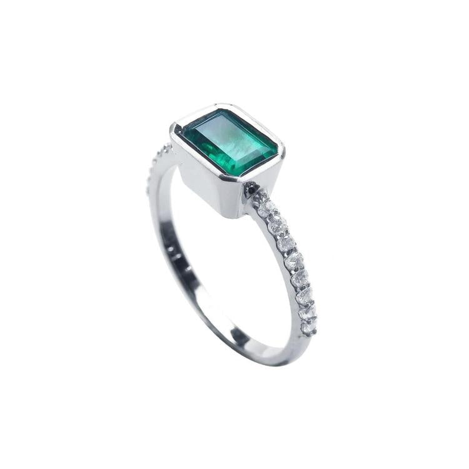 14K white gold ring with a bezel-set rectangular emerald and prong-set accent diamonds.