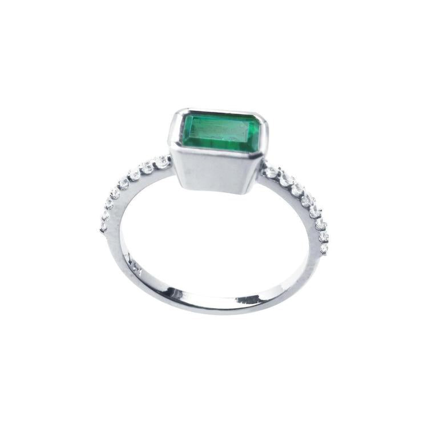 14K white gold ring with a bezel-set emerald and prong-set accent diamonds.