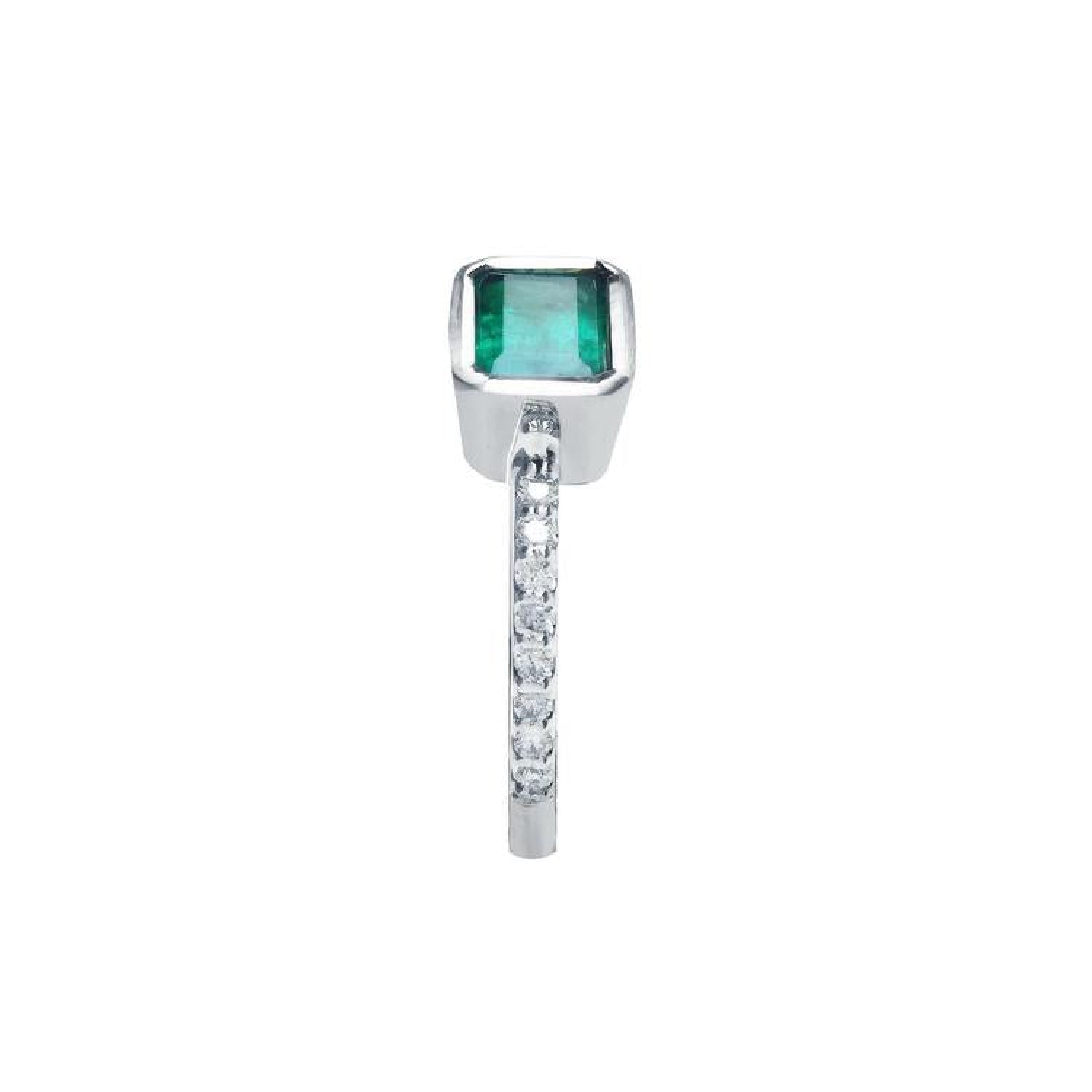 14K white gold ring with a bezel-set emerald and prong-set accent diamonds on the band.