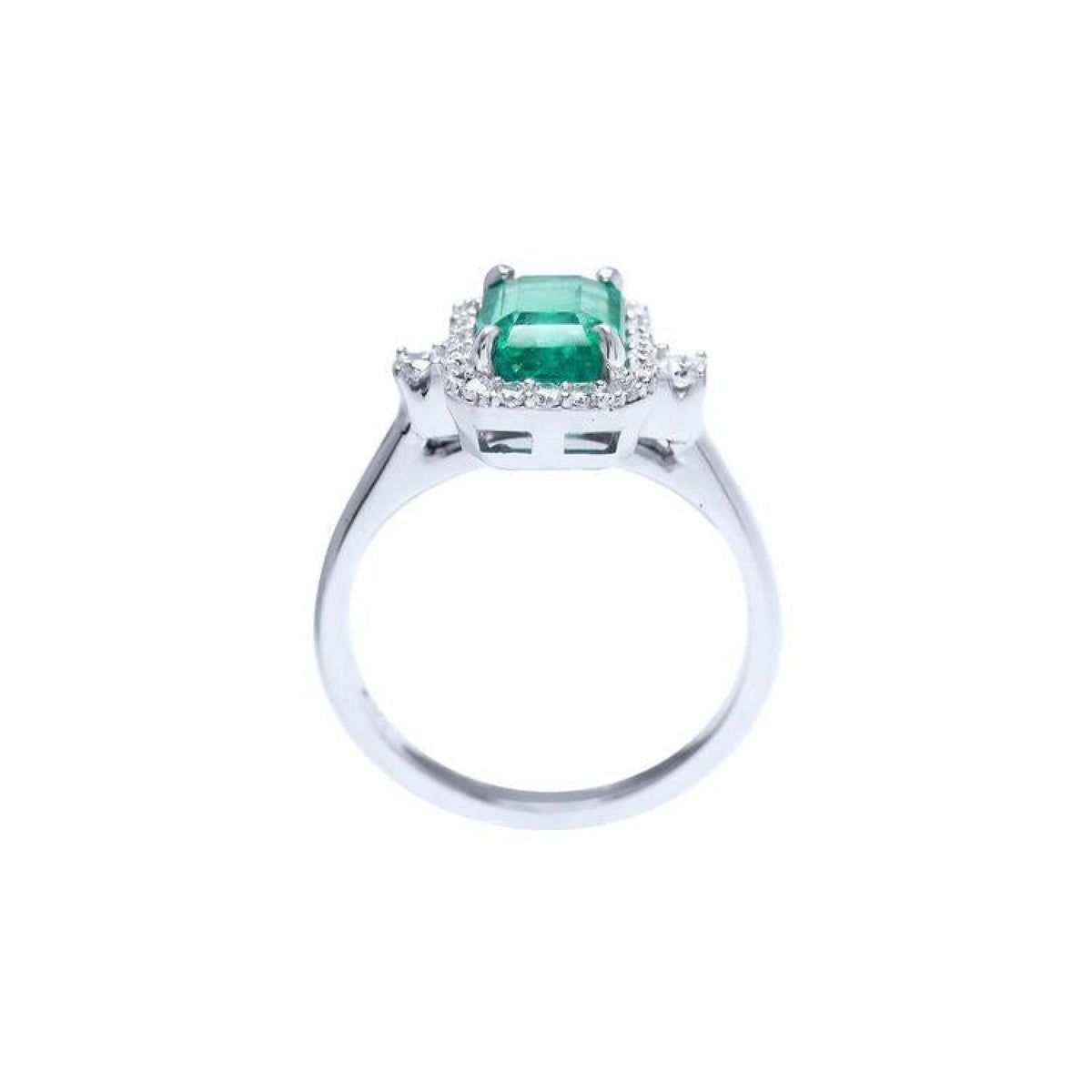 14K white gold engagement ring with emerald cut emerald and diamond halo.