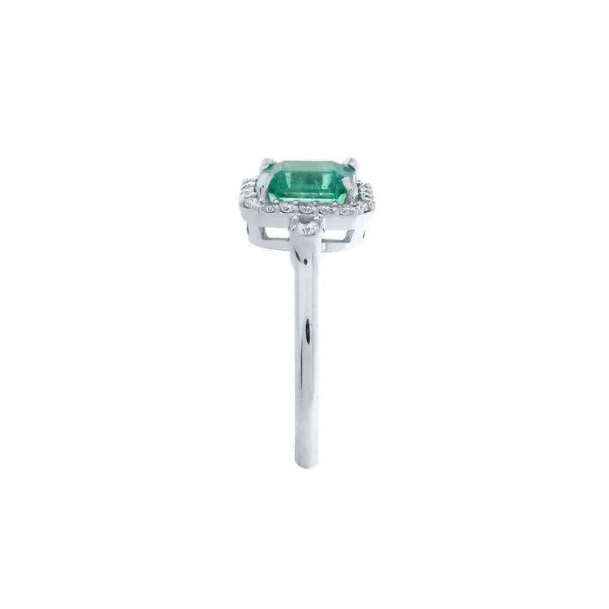 1.47 ct emerald cut emerald engagement ring with diamond halo in 14K white gold.