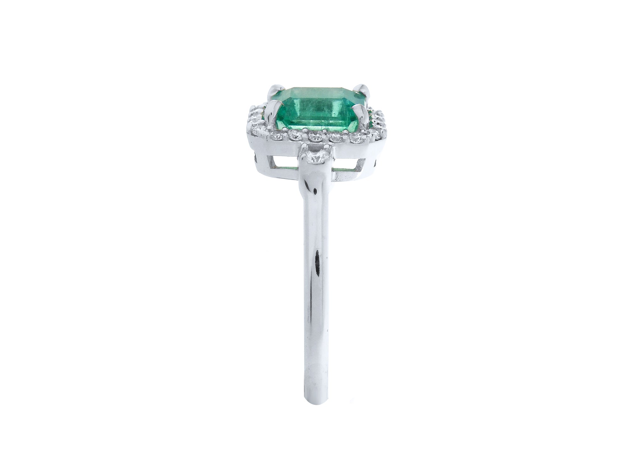 The side view of this emerald engagement ring reveals the top setting and the band design.