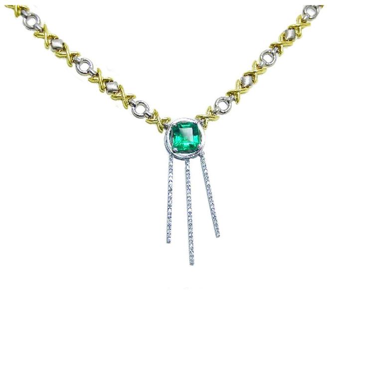 Large view of a Muzo Colombian emerald kisses and hugs necklace, set in 14k white and yellow gold 