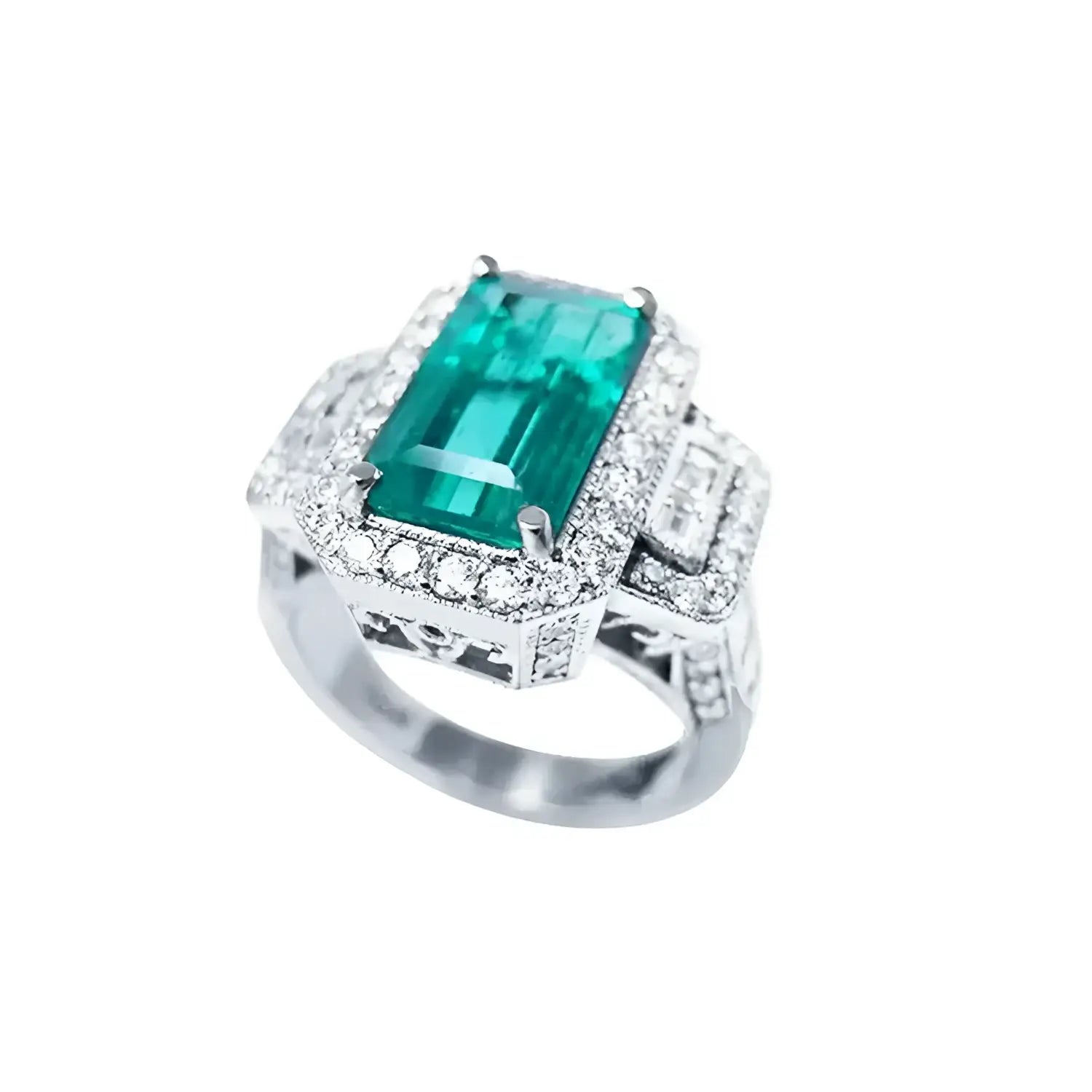 Anillo de compromiso de oro blanco 18k con esmeralda colombiana rectangular de 2.99 ct y diamantes.