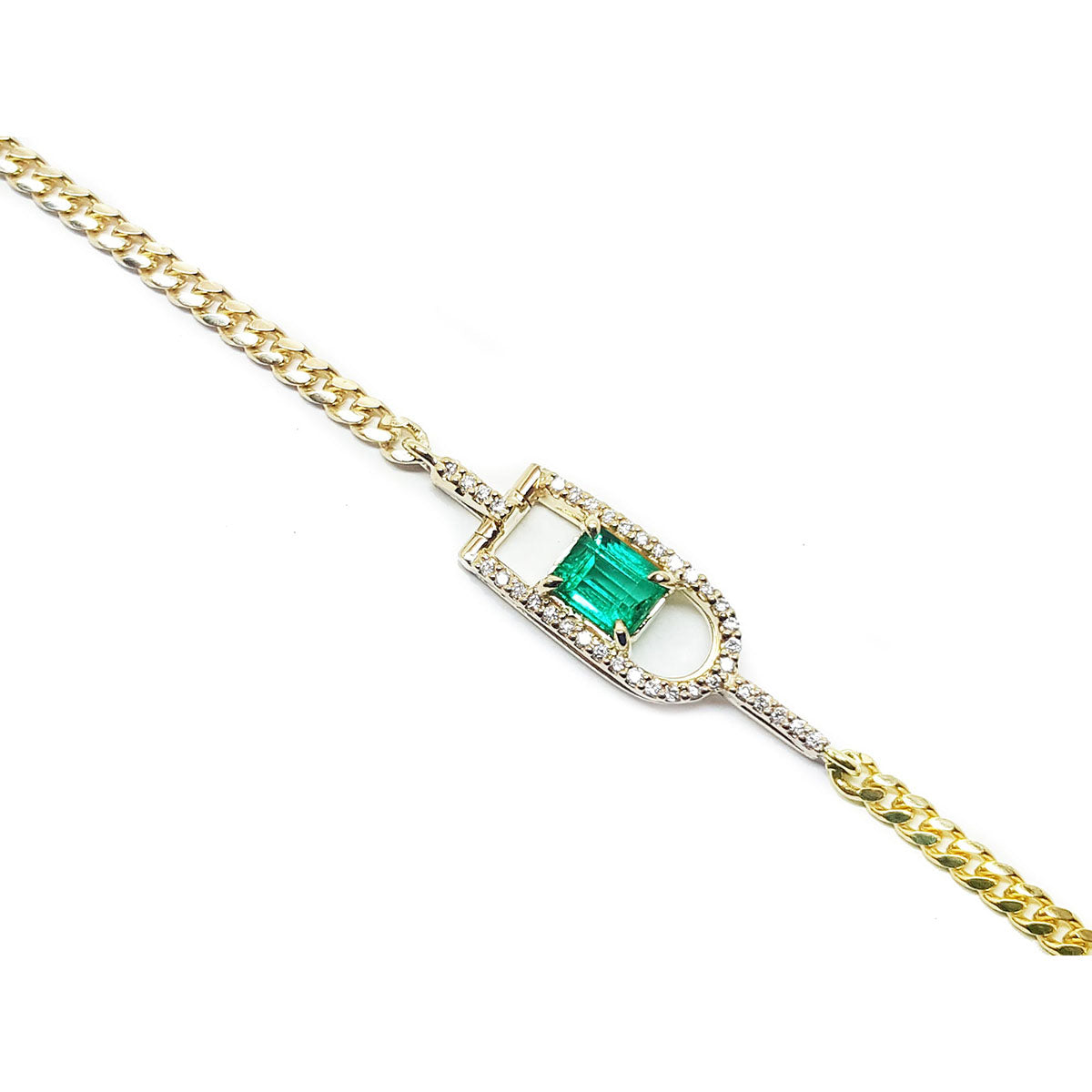 Gold bracelet with a square colombian emerald on a white background
