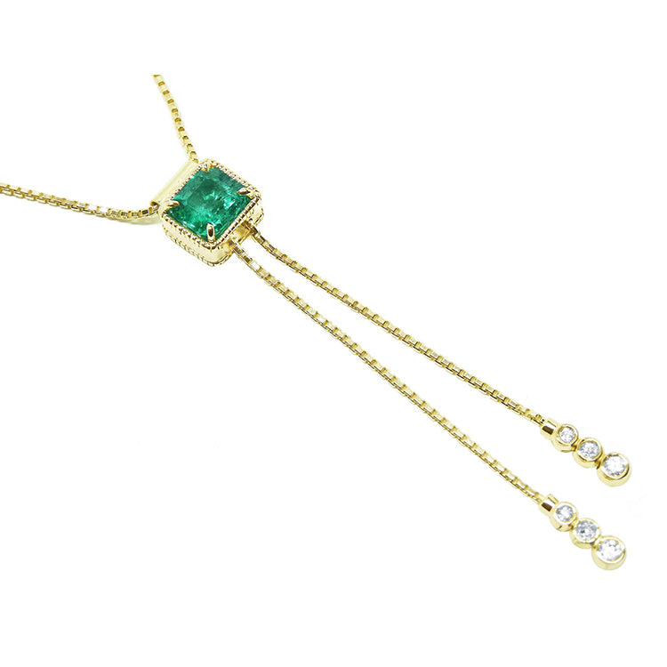 Genuine emerald lariat necklace set in 14k yellow gold fine emerald-cut sourced from the Muzo mines in Colombia