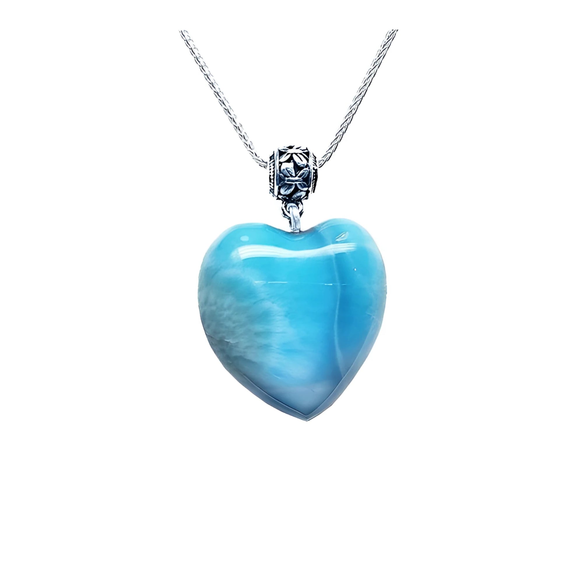 Heart-shaped blue and white larimar pendant with a decorative sterling silver bail on a silver chain.