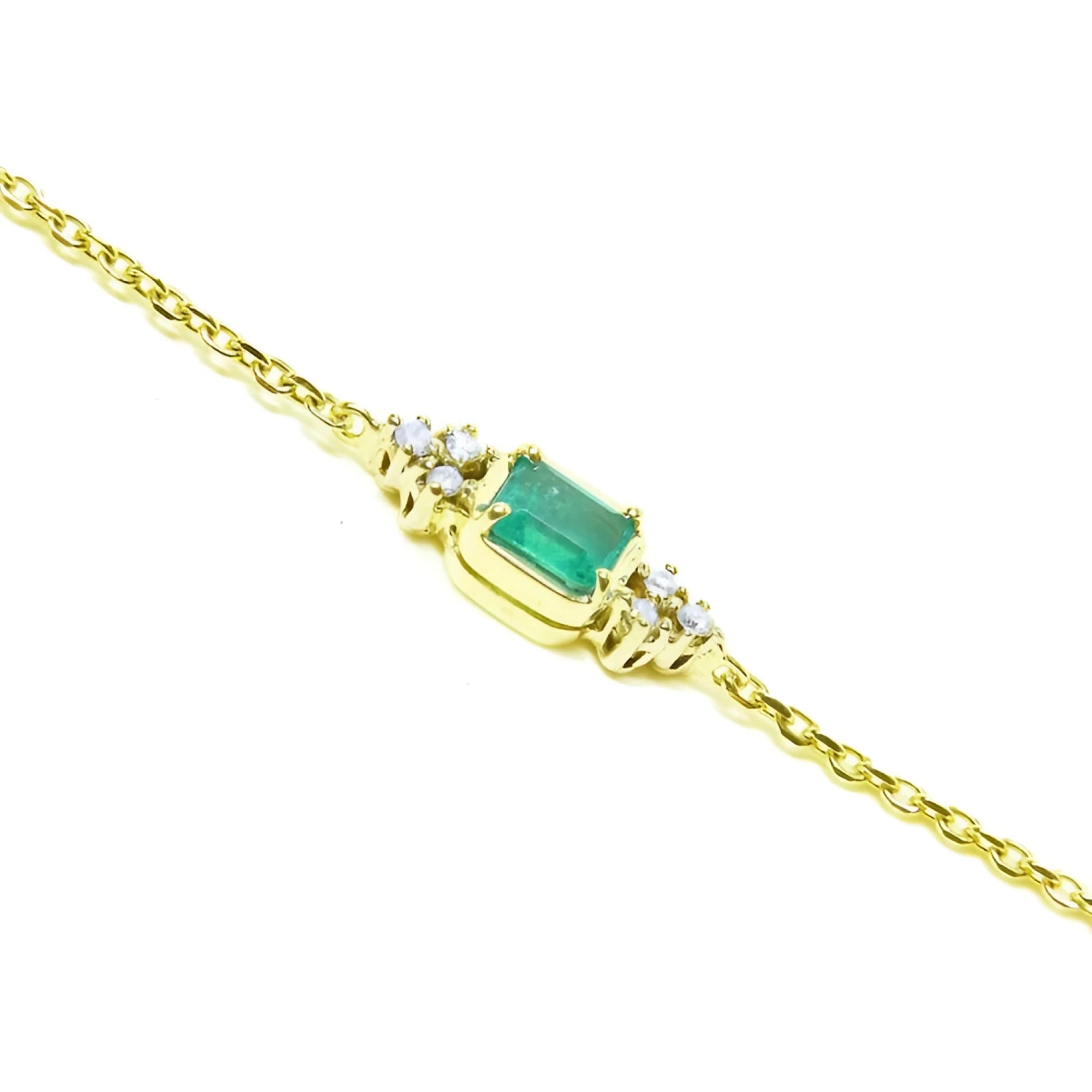 14k yellow gold women's bracelet with a rectangular Colombian emerald and six natural diamonds.