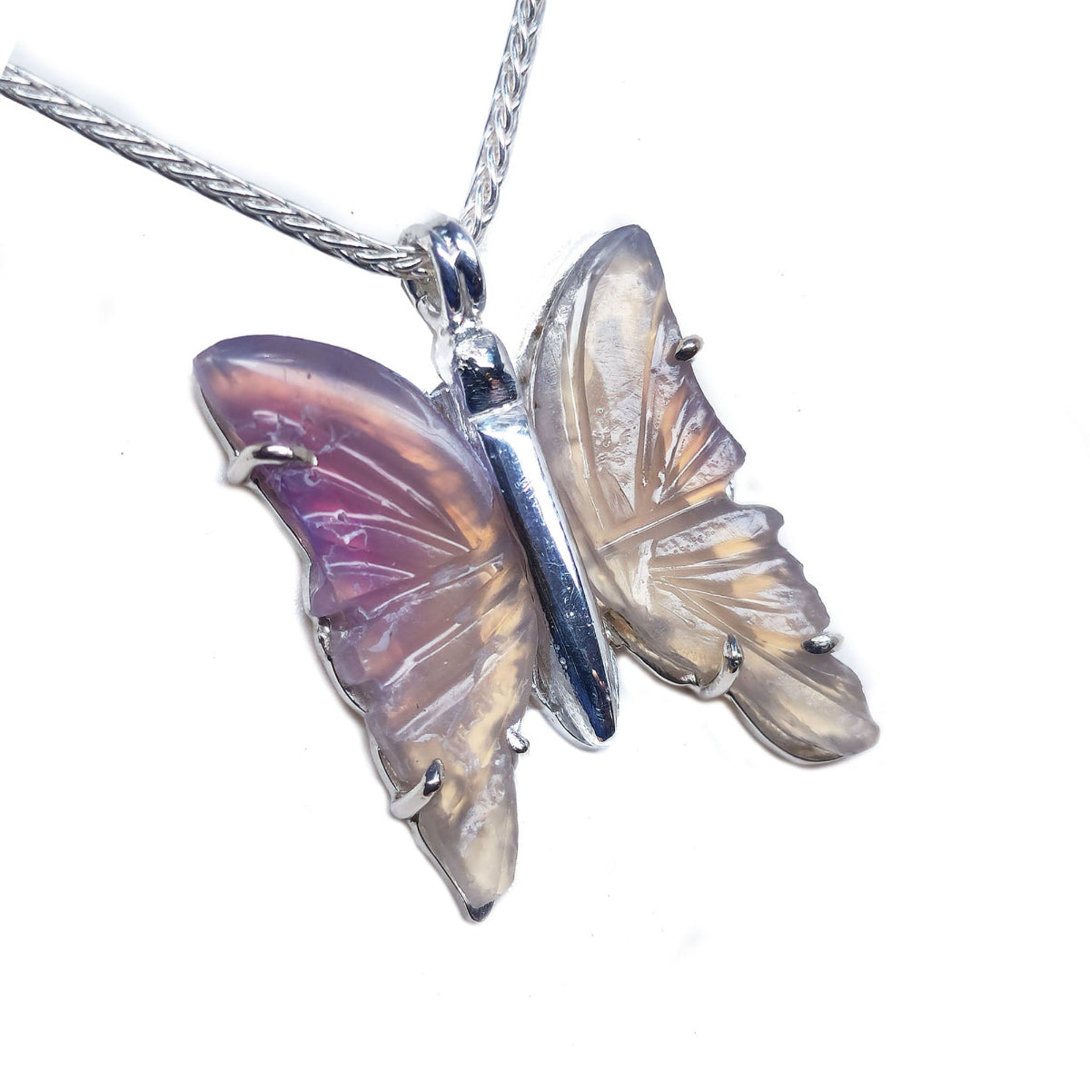 Agate lavender color butterfly-shaped pendant sterling silver necklace on a white background 